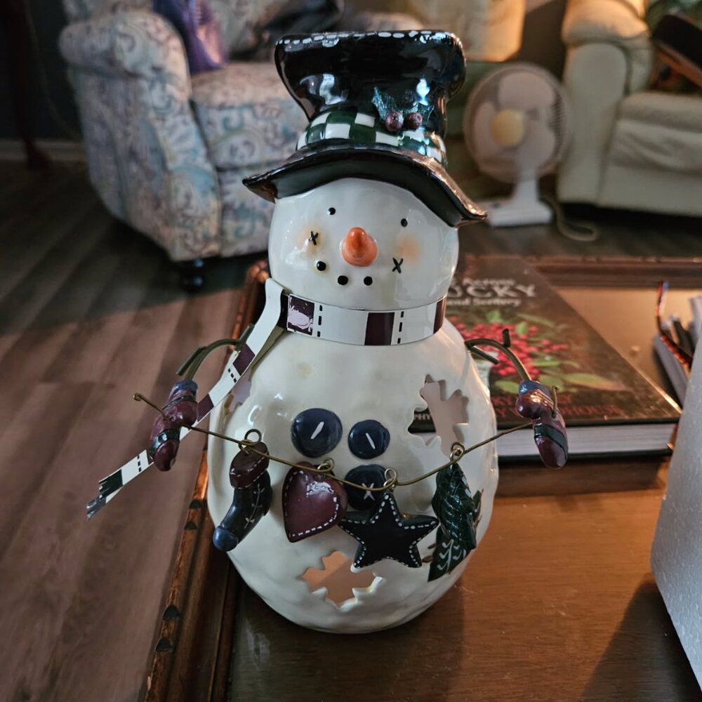 Adorable snowman candle holder